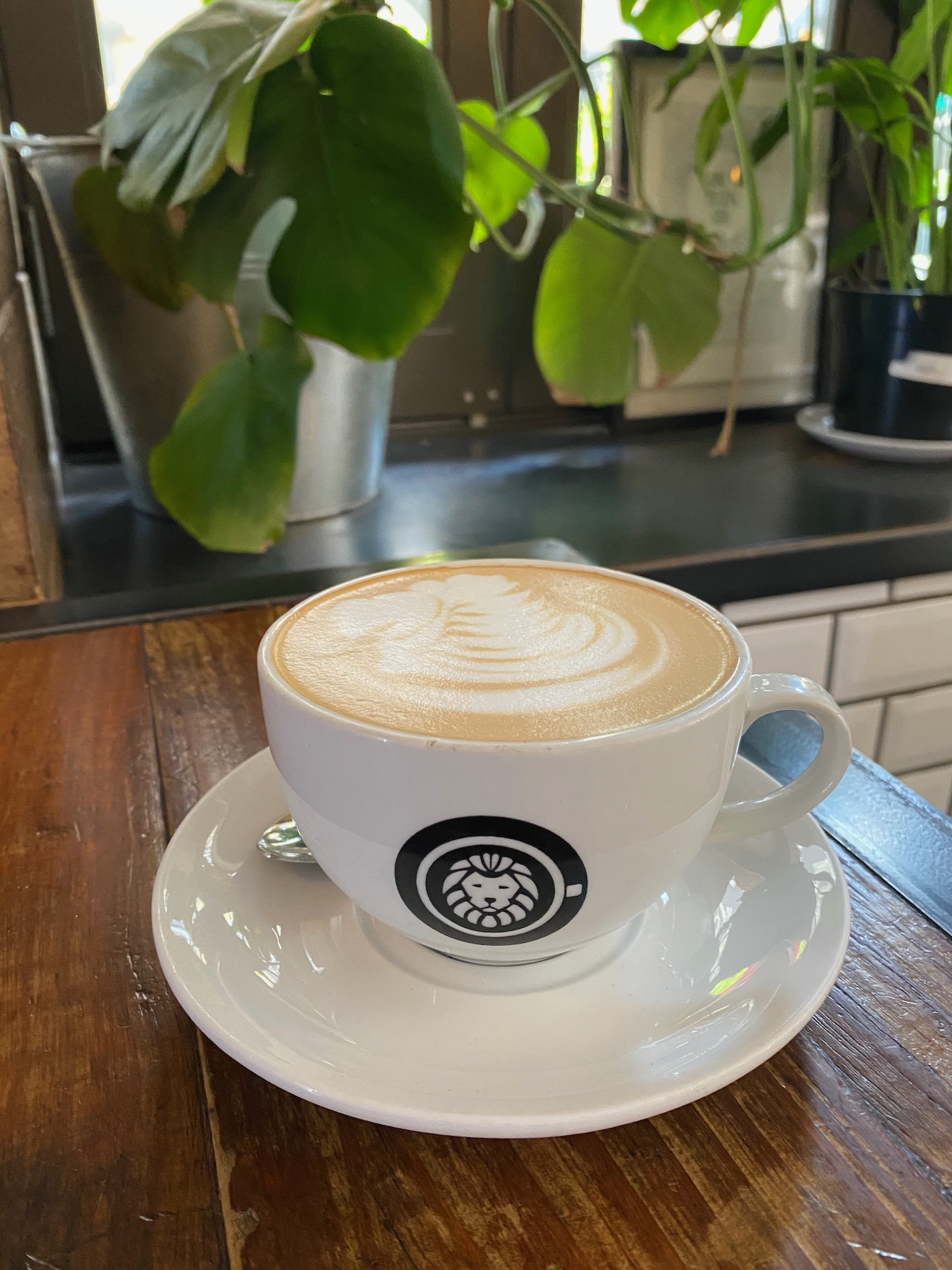 a cup of coffee on a saucer