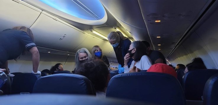 a group of people on an airplane