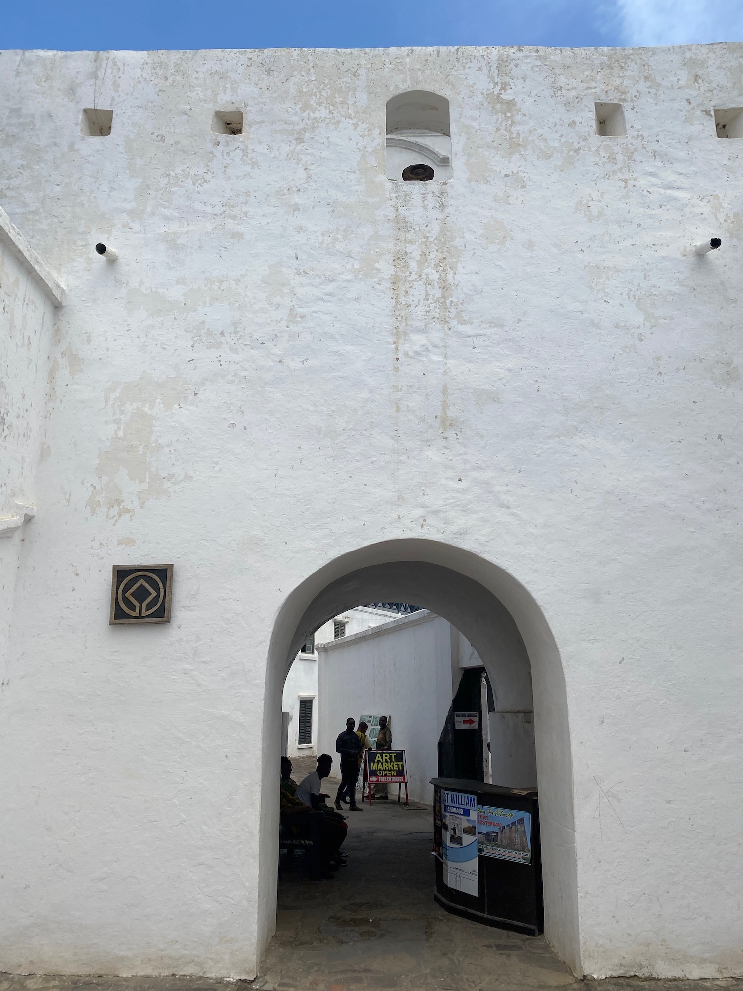 a white building with a archway