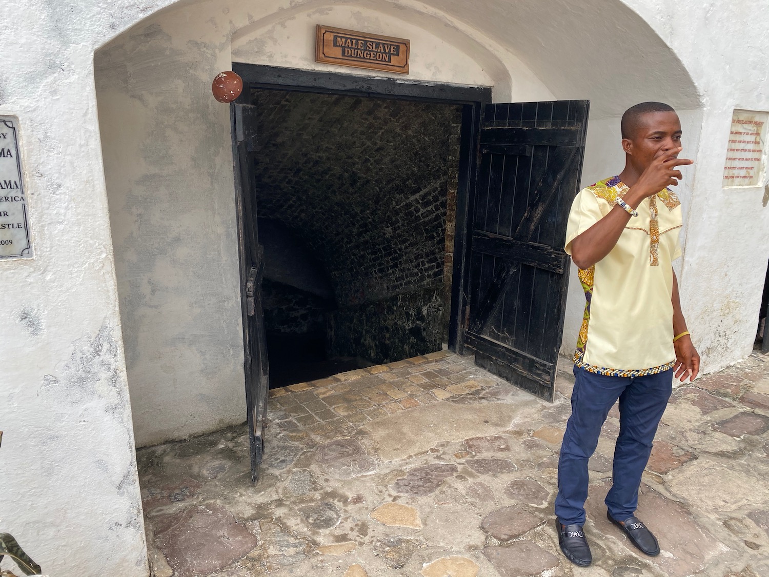 a man standing in front of a doorway