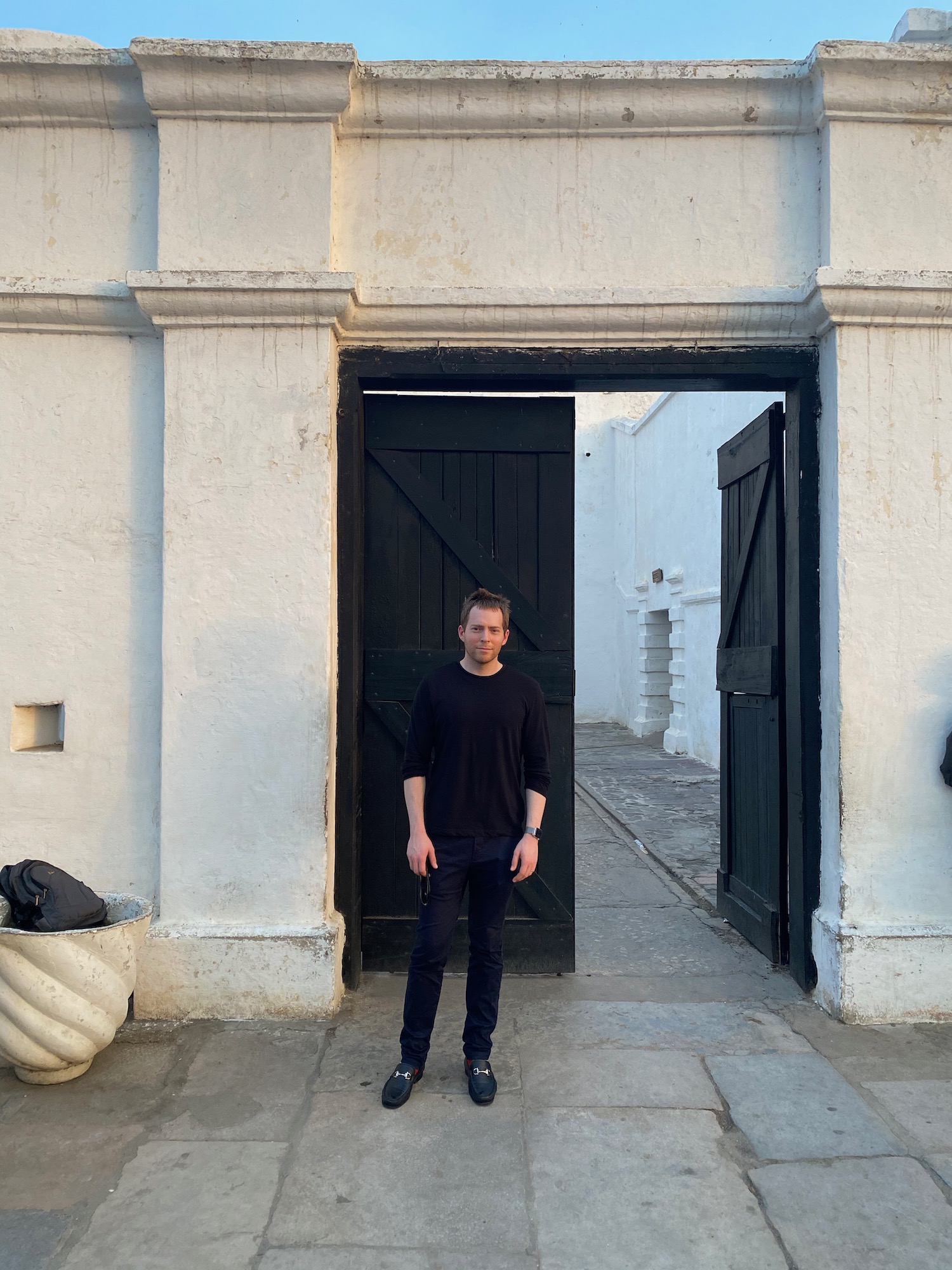 a man standing in front of a door