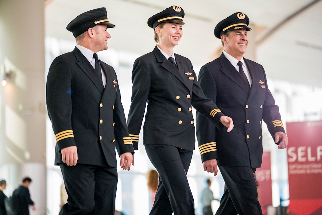 a group of people in uniform walking