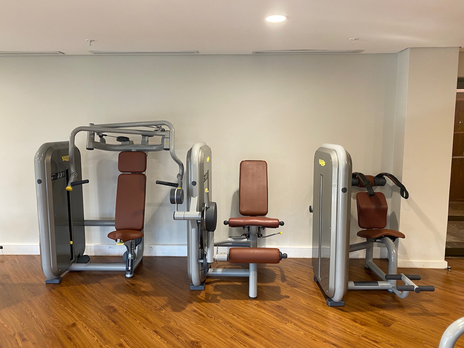 a group of exercise equipment in a room