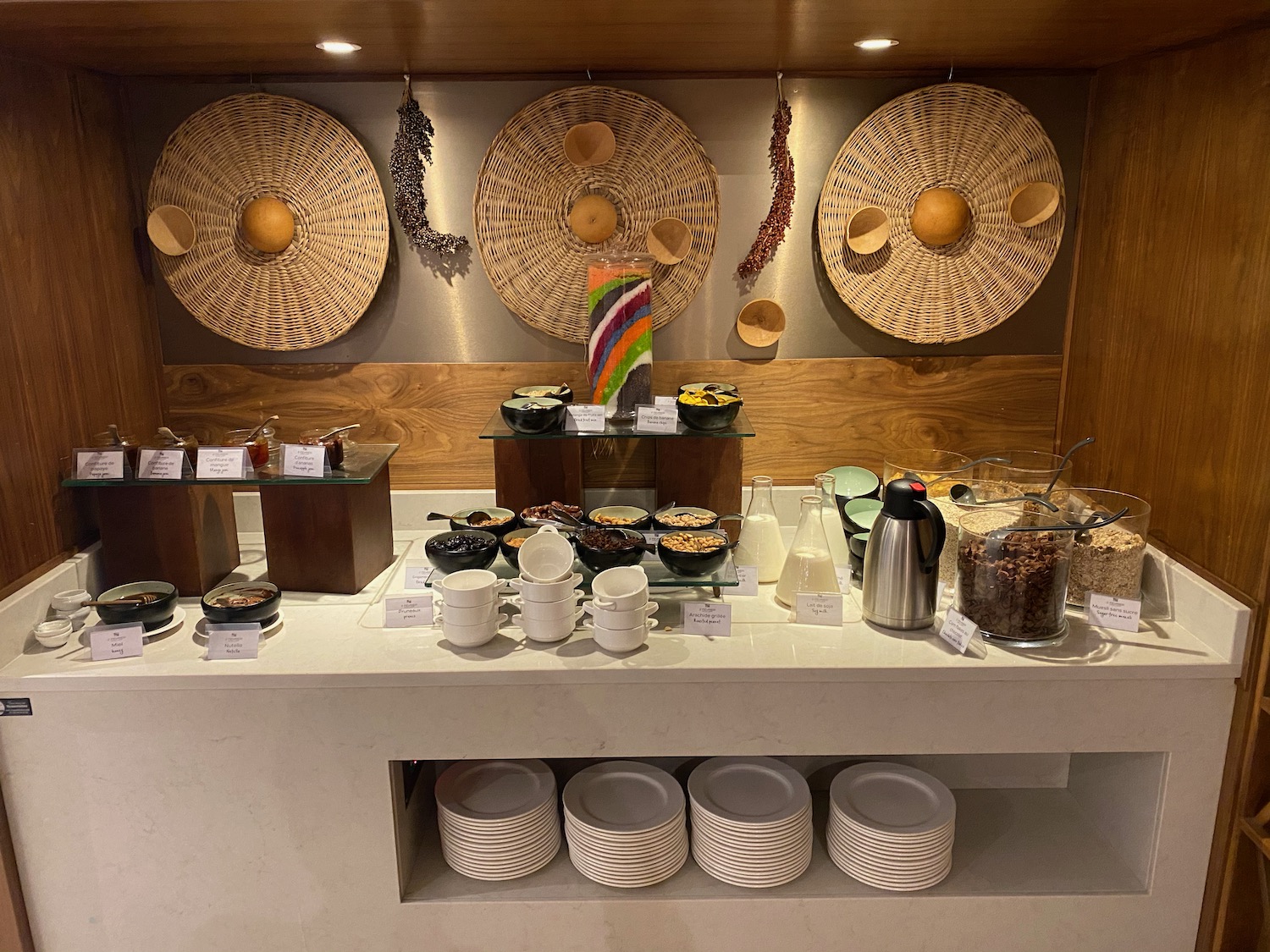 a buffet with plates and bowls