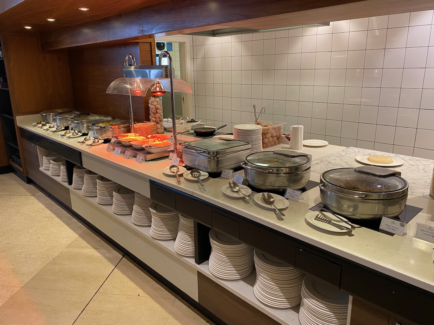 a buffet line with food on it