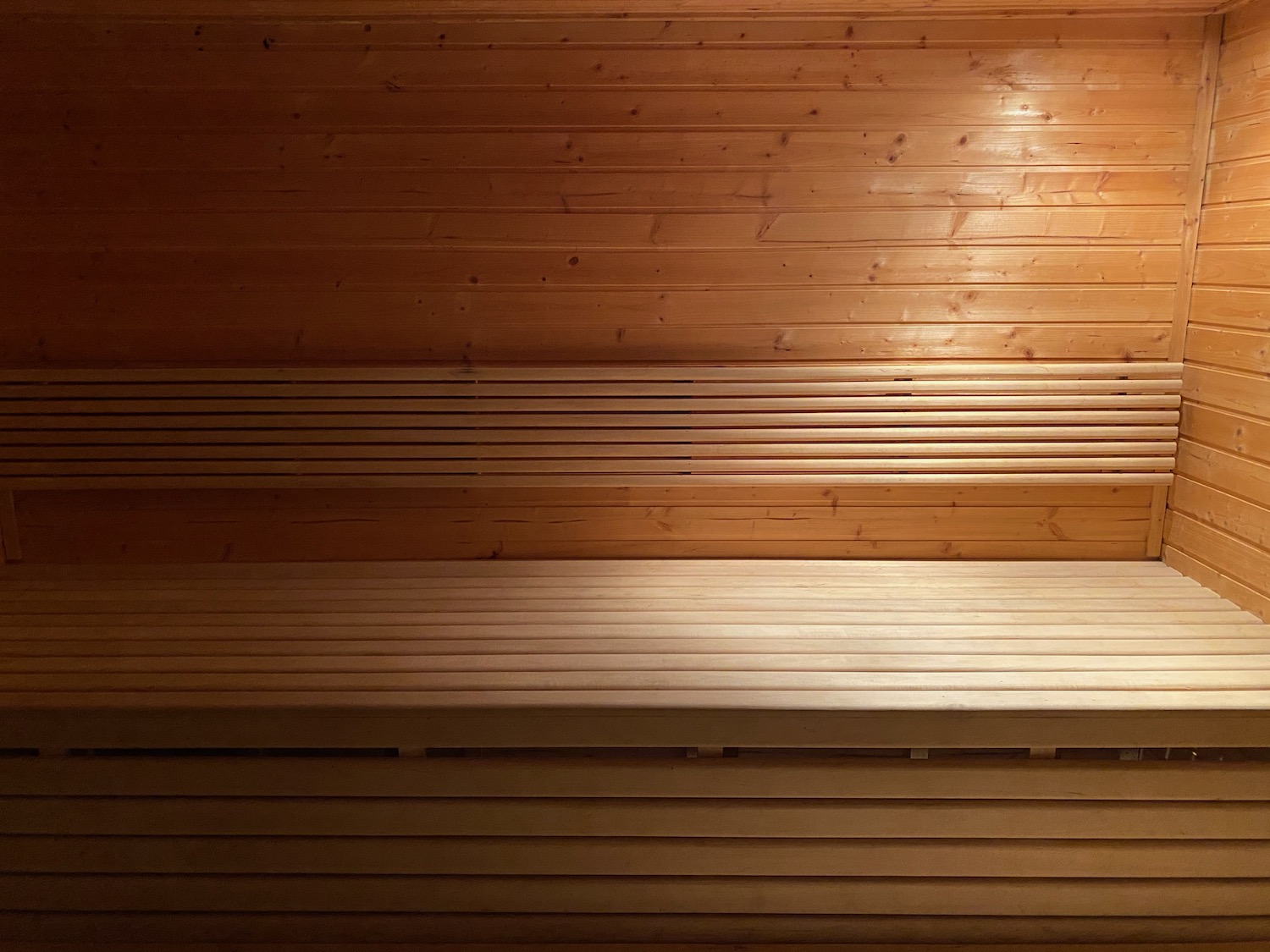 a wooden bench in a sauna