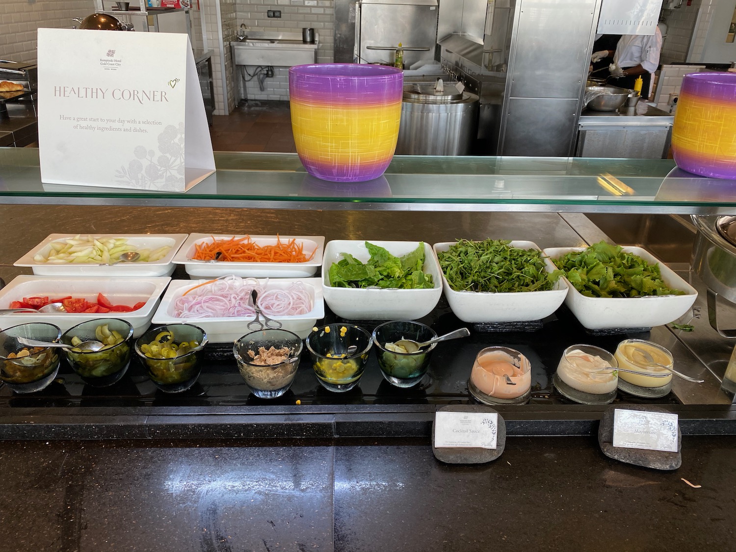 a salad bar with different types of food