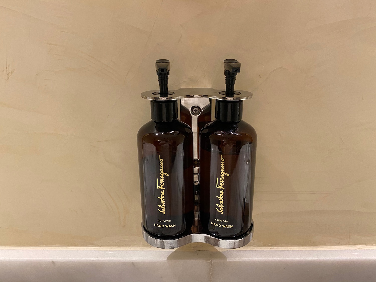 a couple of brown bottles on a metal holder