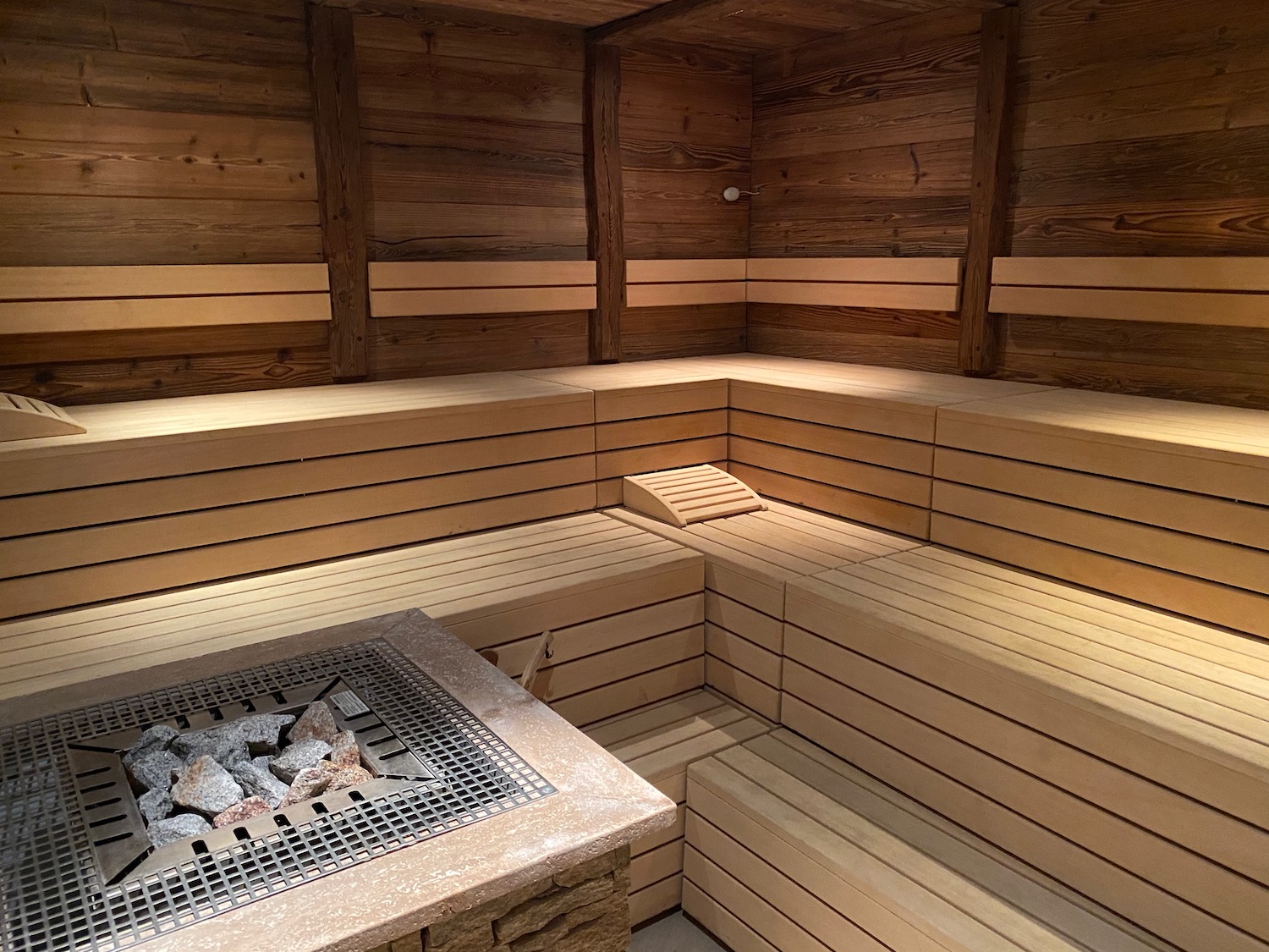 a sauna with a fire pit