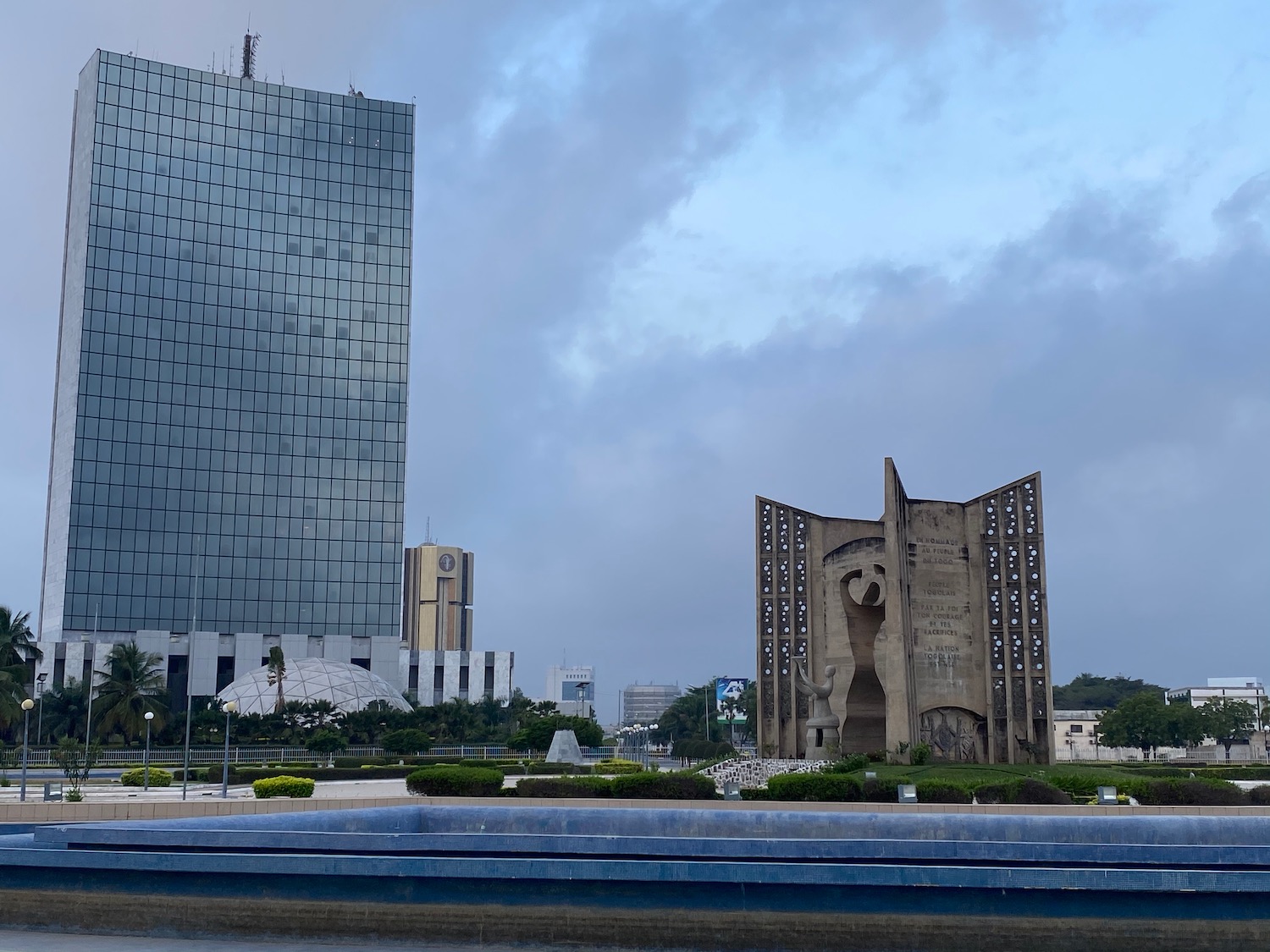 a large building with a large statue in front of it