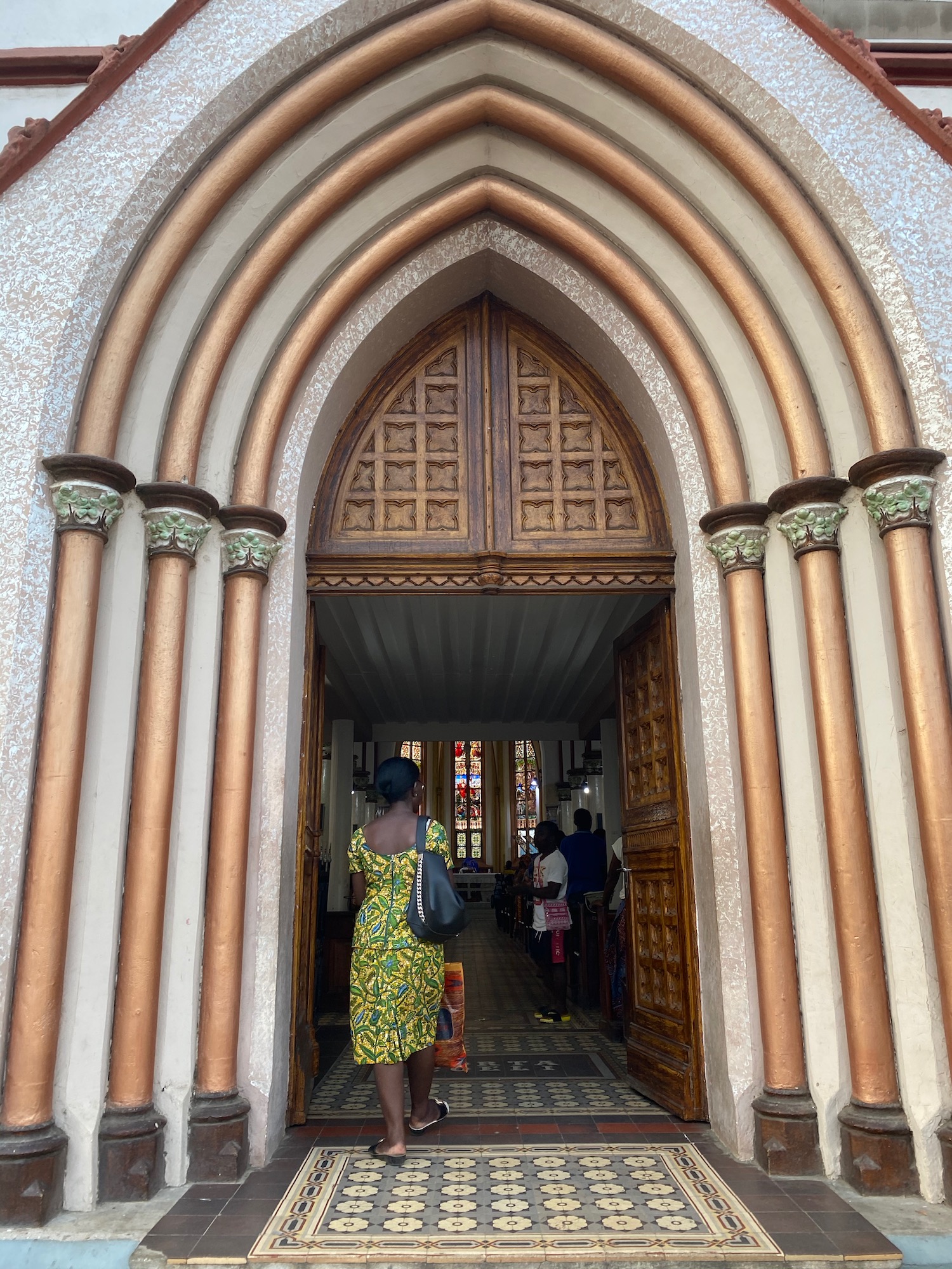 a woman standing in a doorway