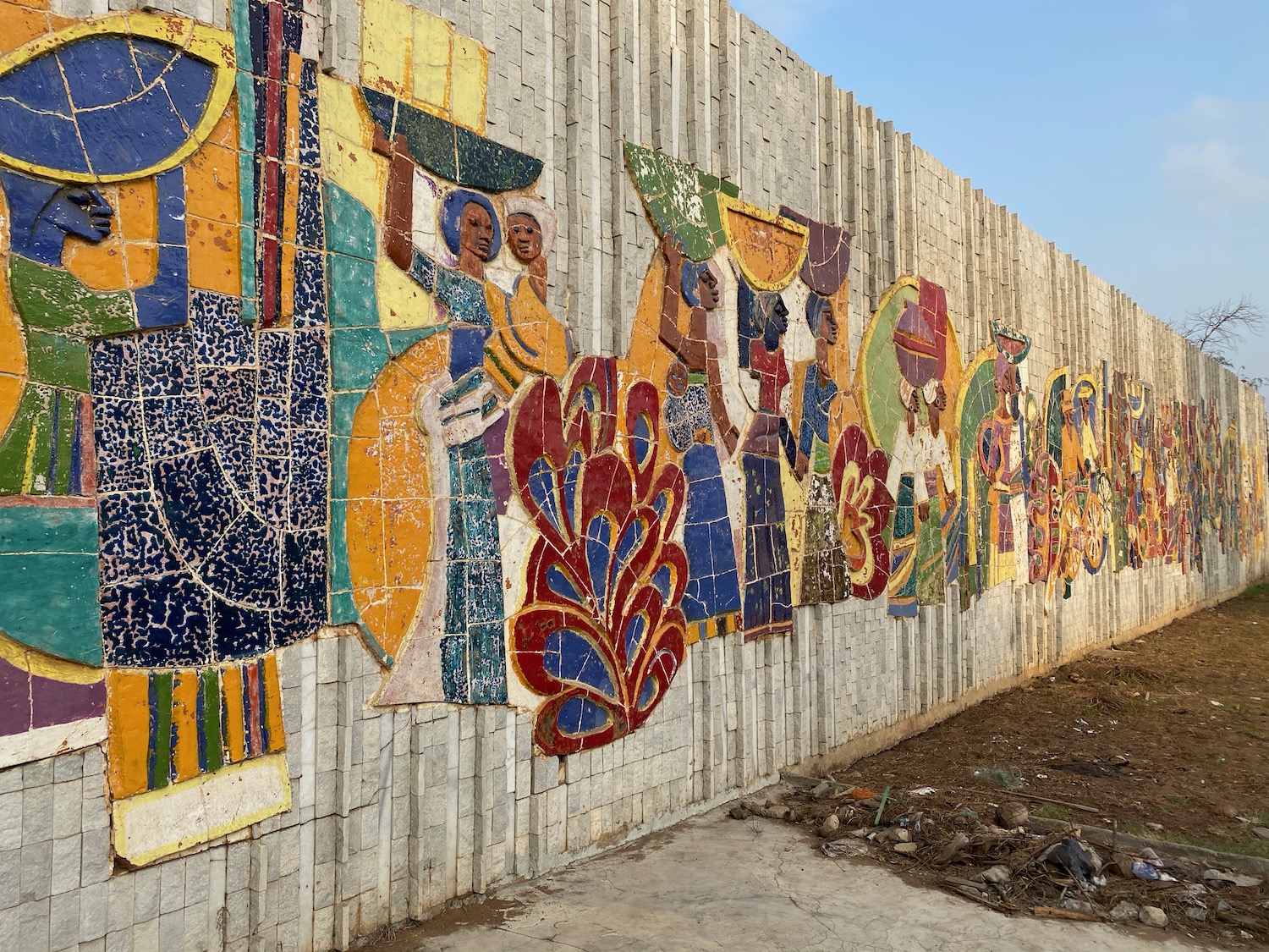 a wall with colorful mosaics on it