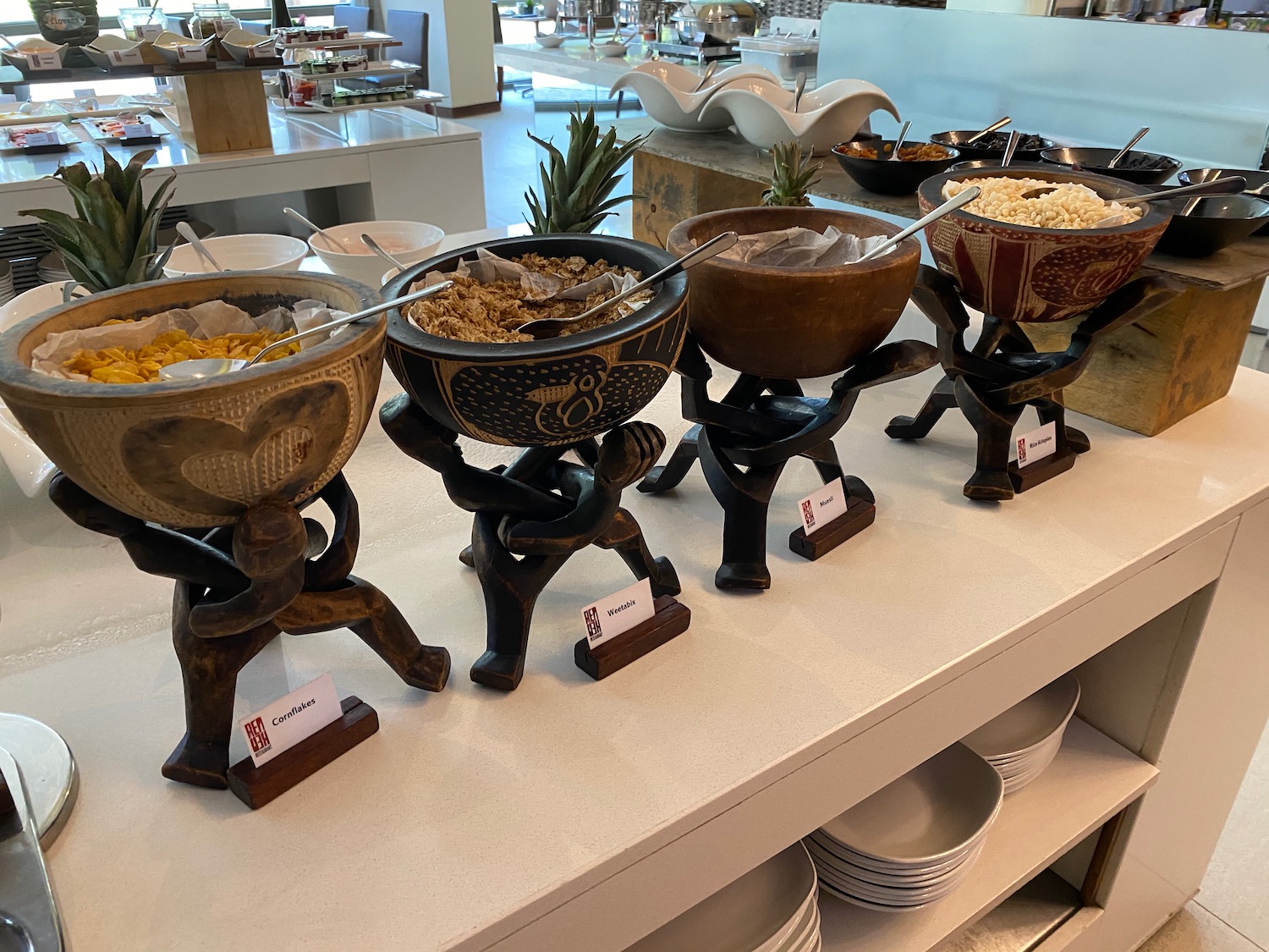 a group of bowls of food on a table