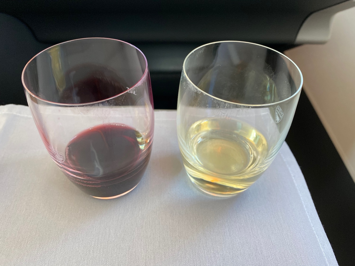 two glasses with liquid in them