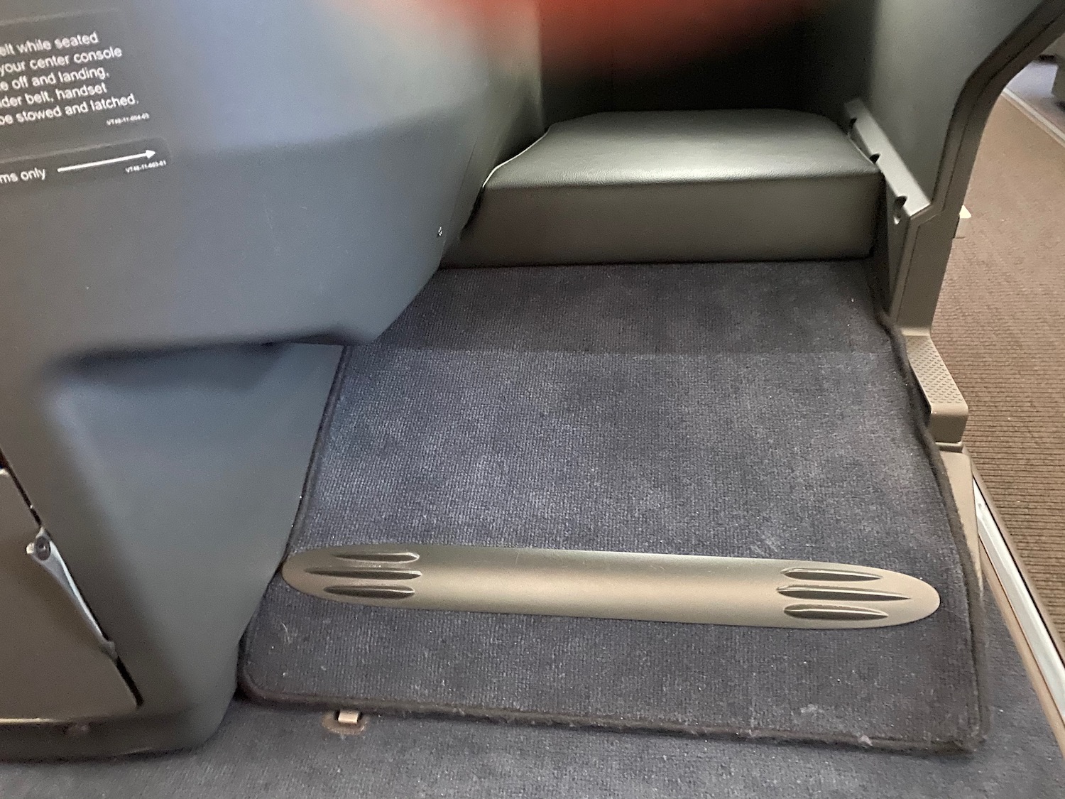 a carpeted floor in a vehicle