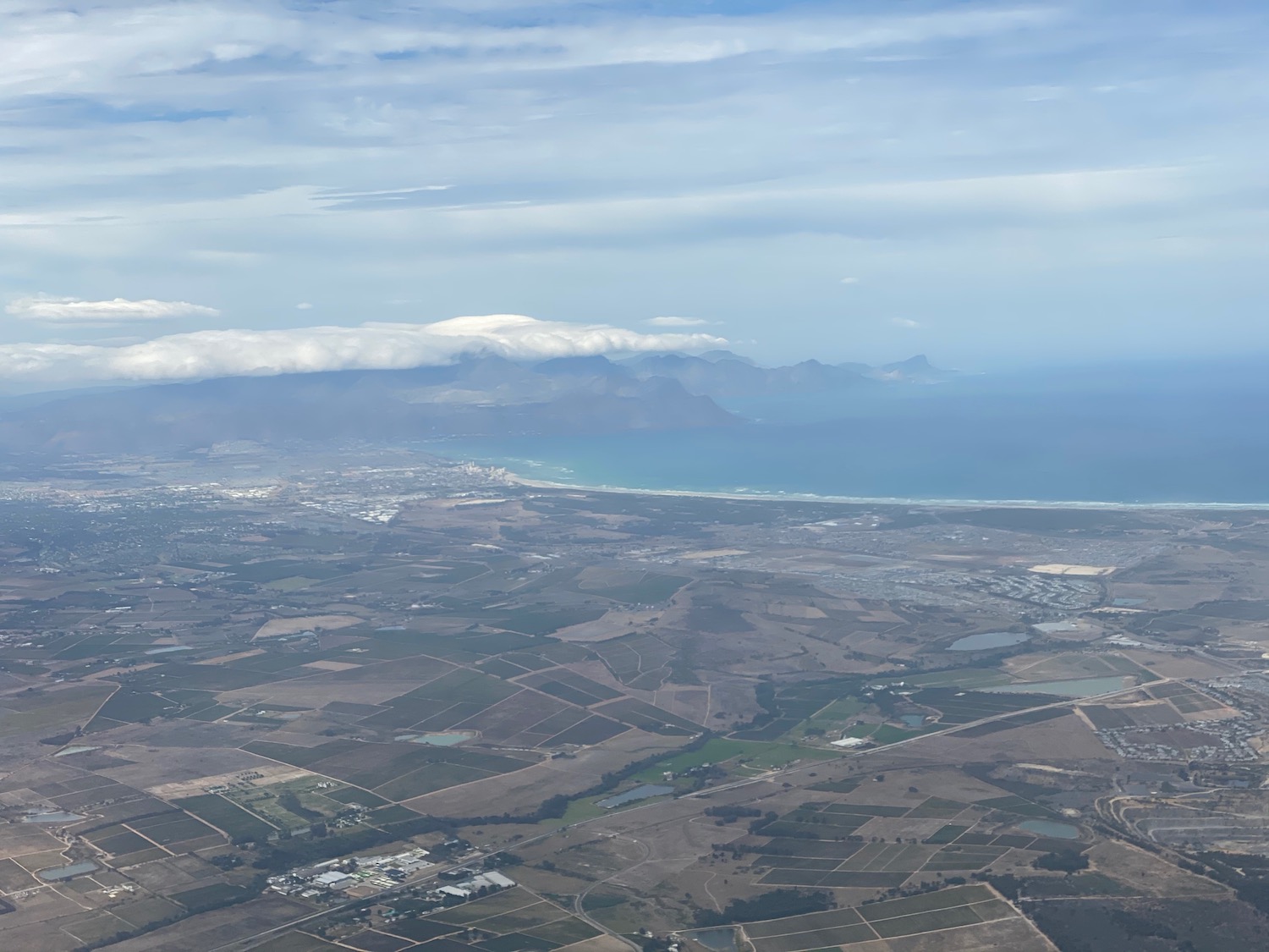 aerial view of a city and the ocean