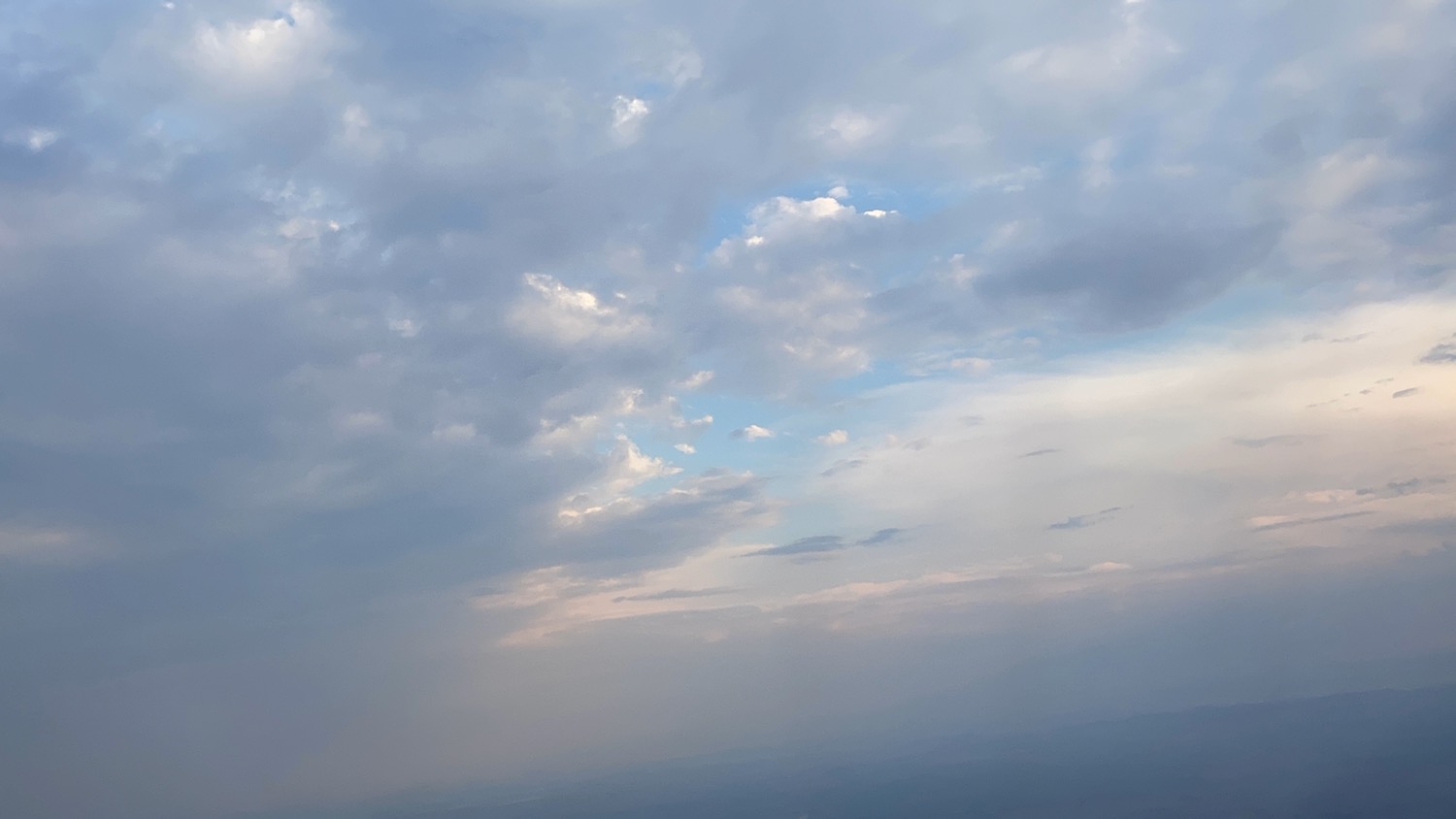 a cloudy sky with clouds