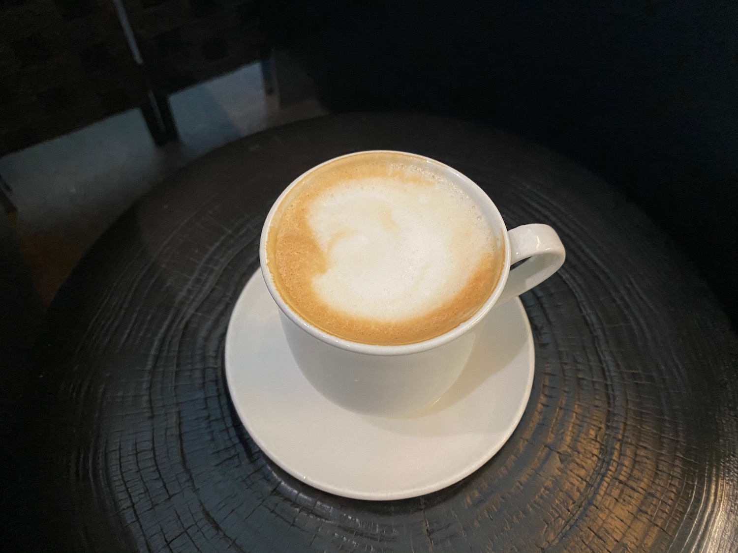 a cup of coffee on a saucer