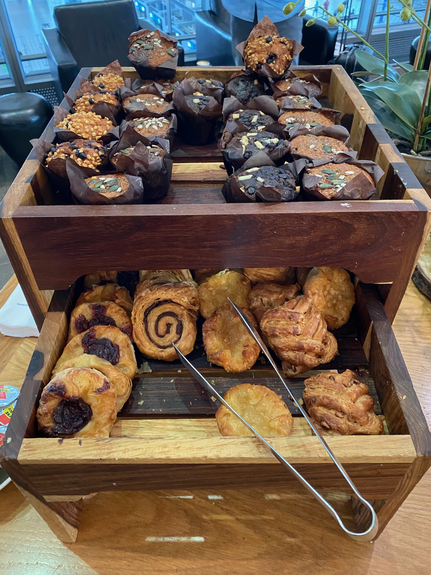 a wooden tray with pastries and pastries