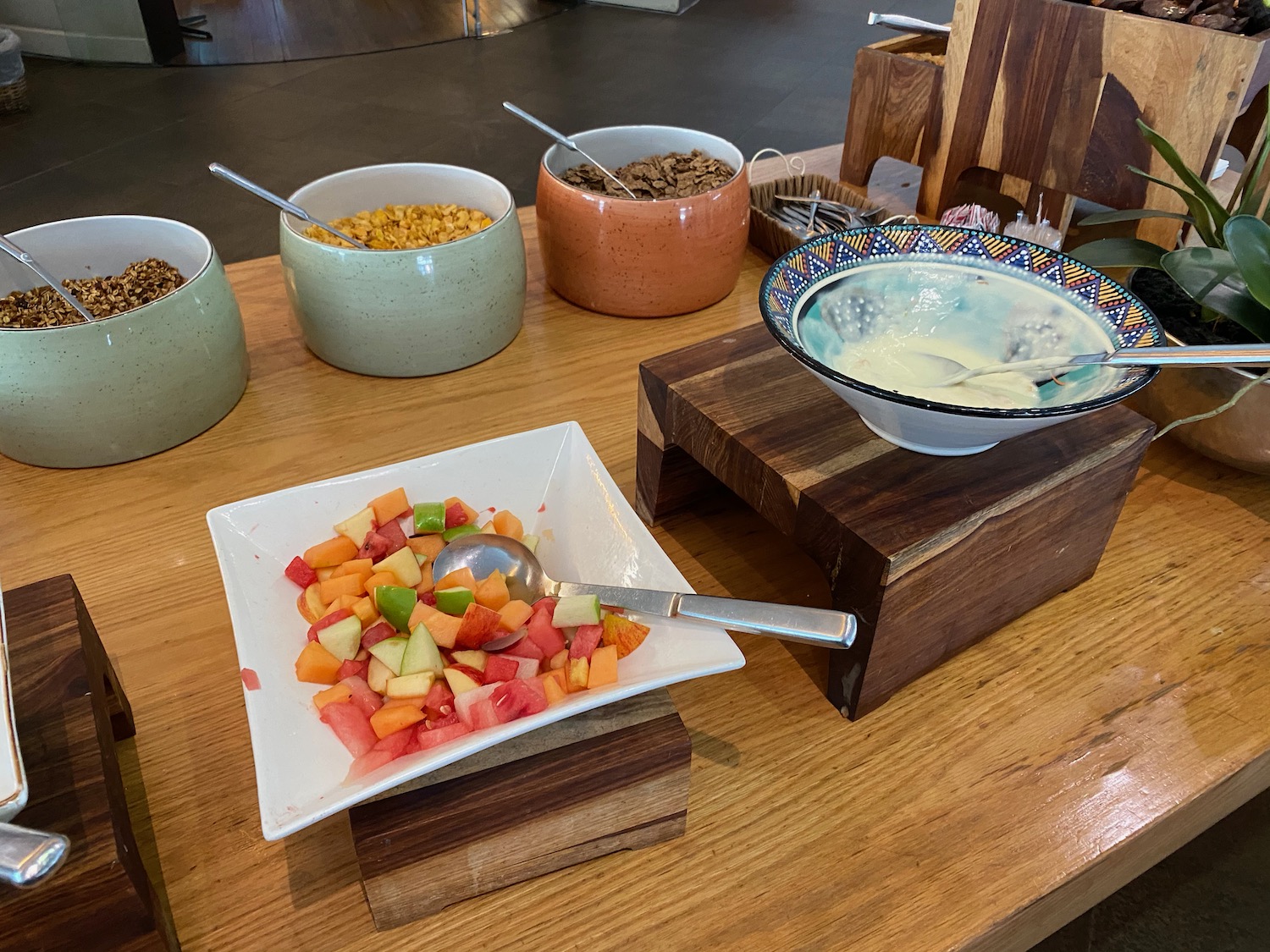 a bowl of fruit on a table