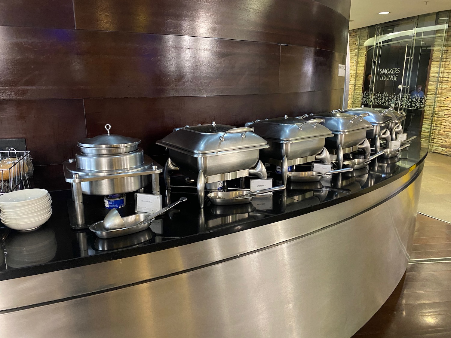 a group of silver containers on a counter