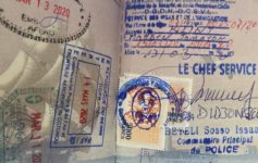 a passport with stamps and stamps