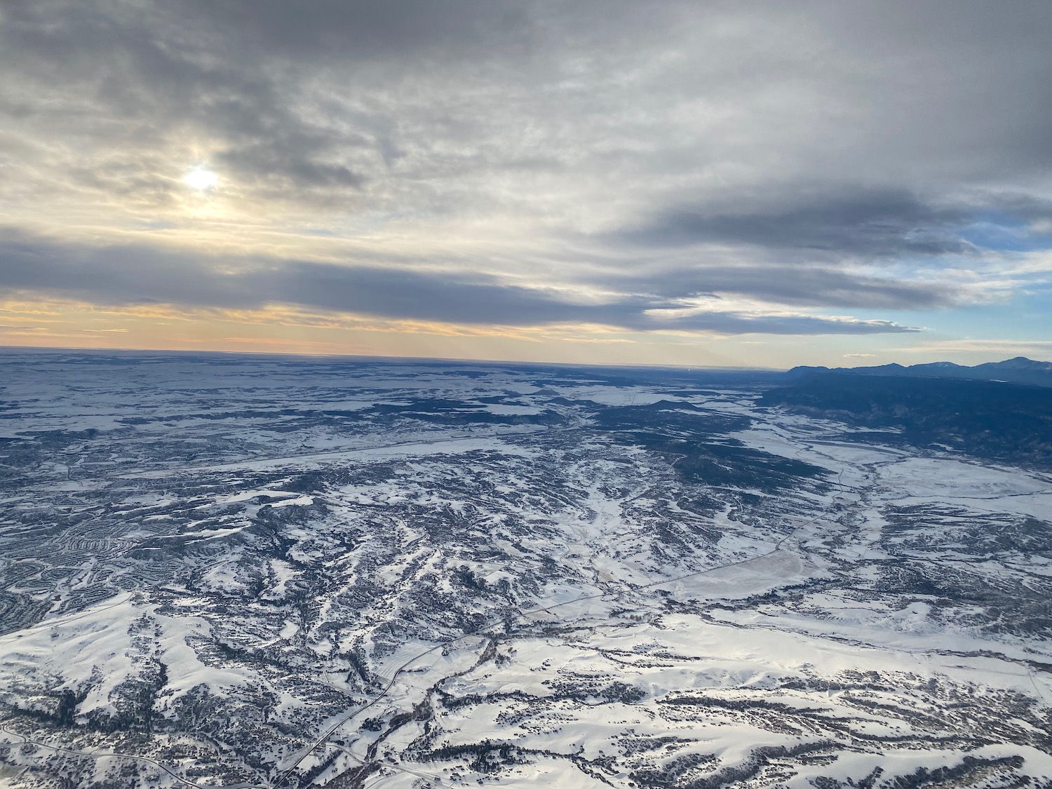 a aerial view of a snowy landscape