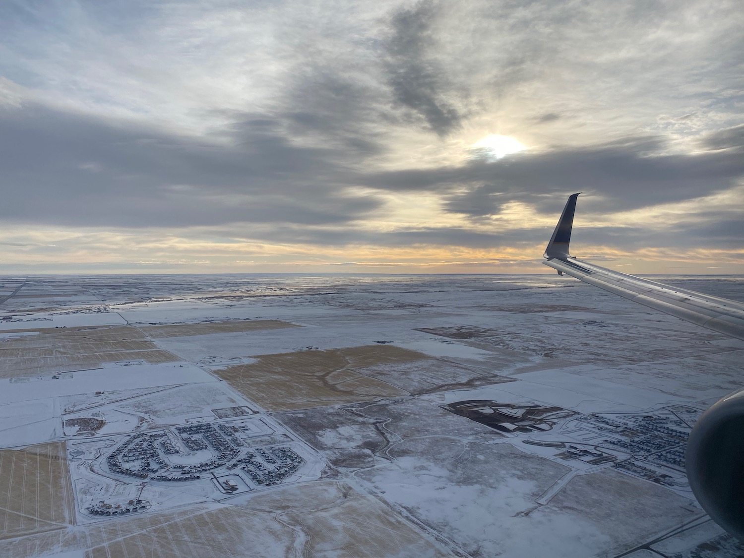 an airplane wing in the snow