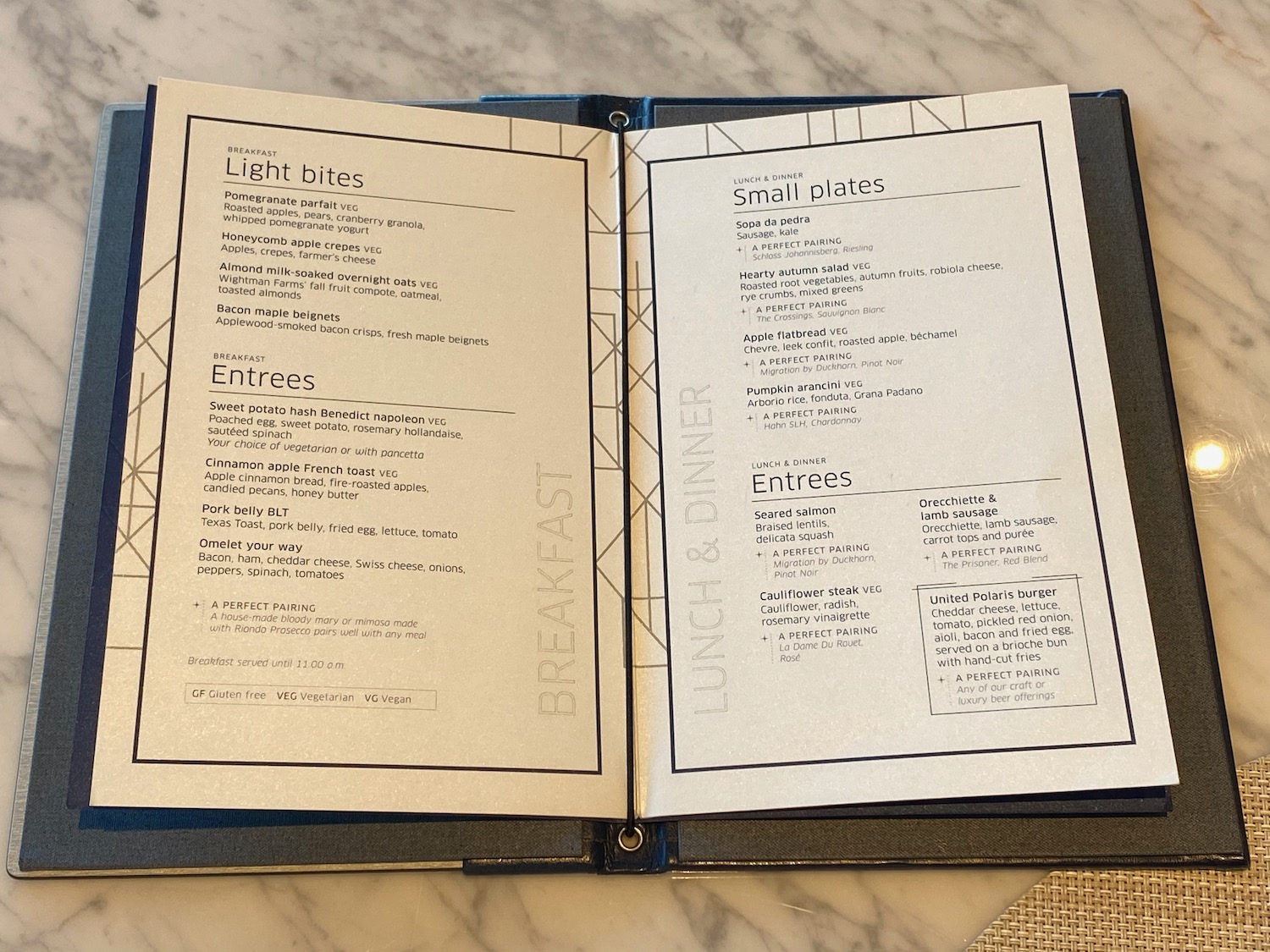 a menu open in a restaurant