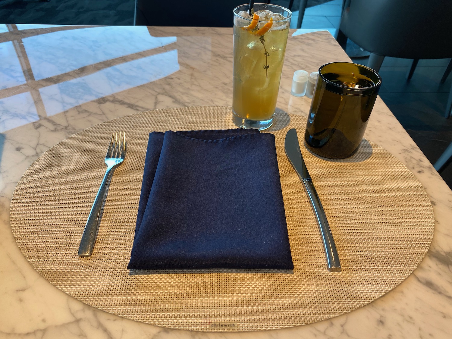 a napkin and fork on a table