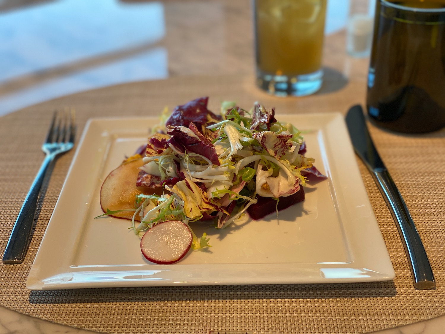 a plate of salad on a table