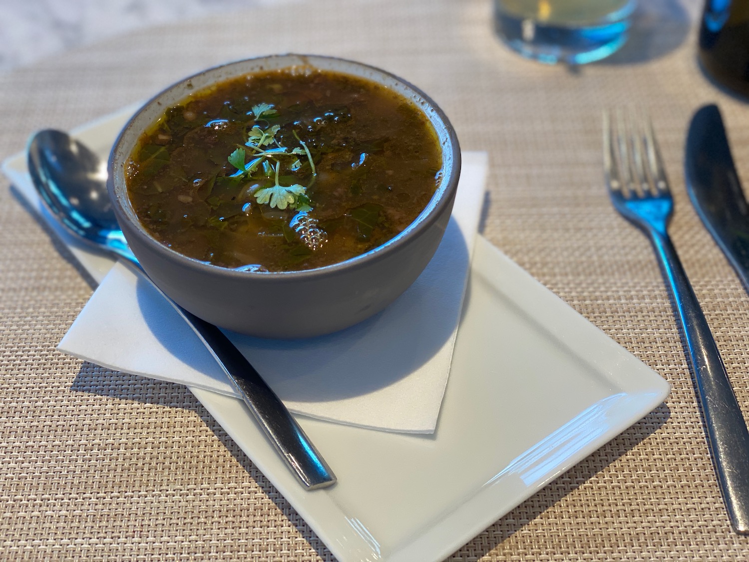 a bowl of soup on a plate