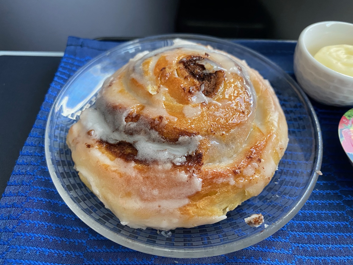 a cinnamon roll on a plate