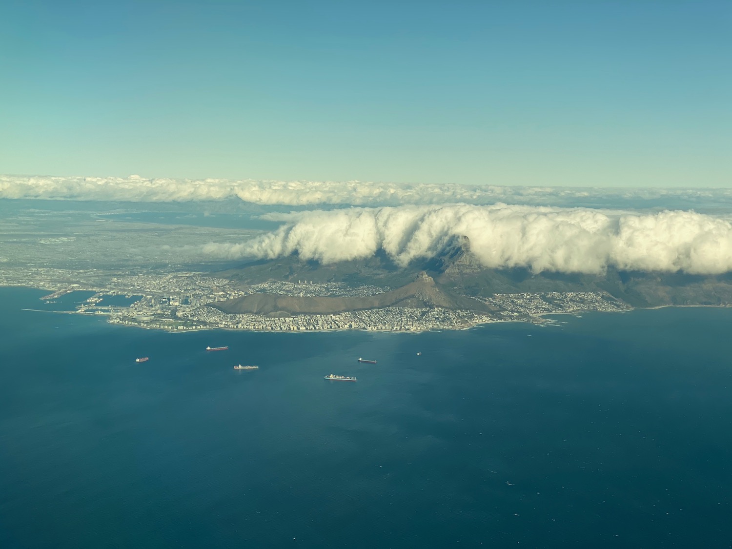 a aerial view of a city and a body of water