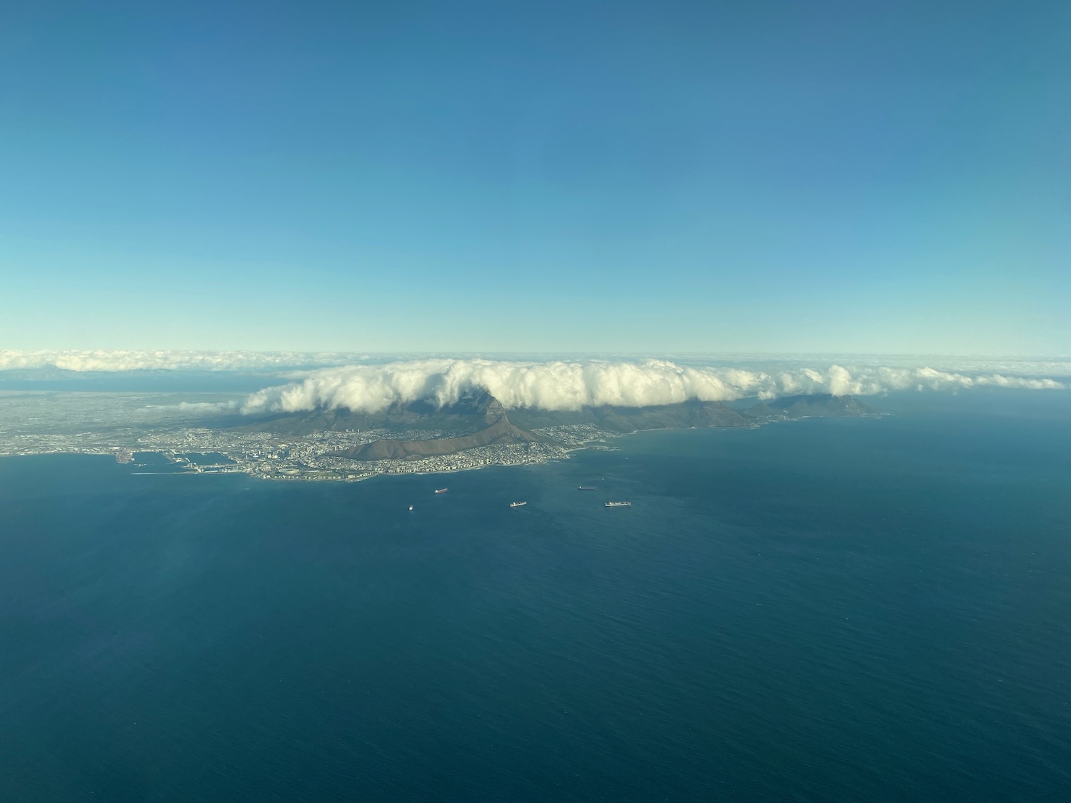 a aerial view of a city and water