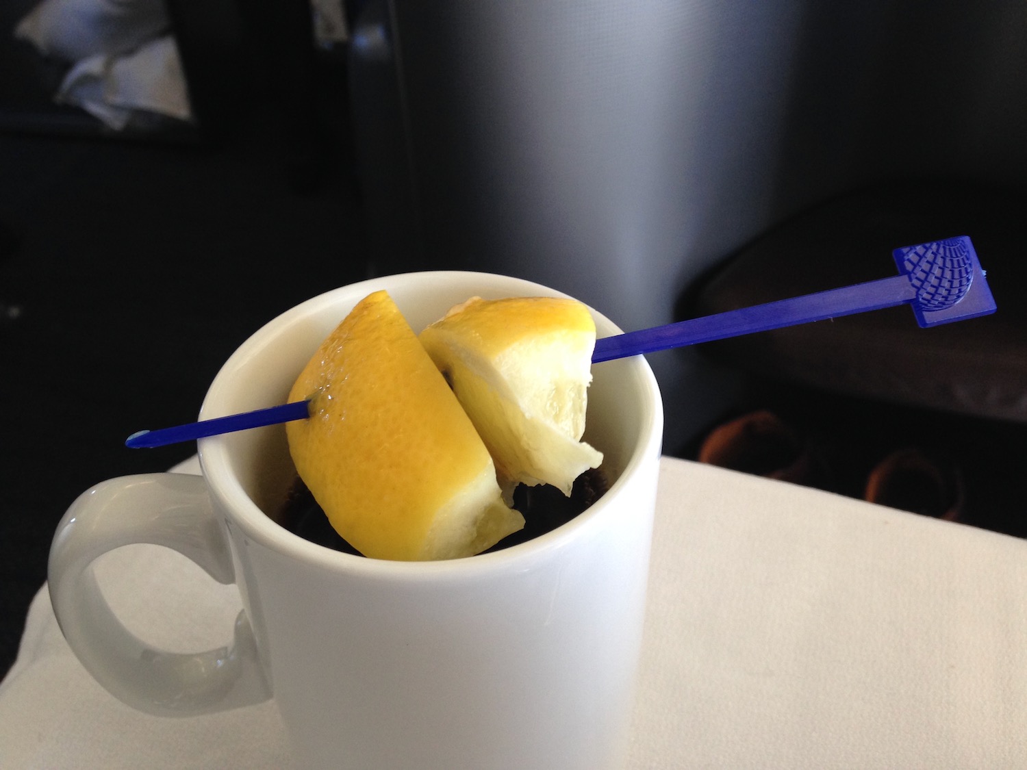 a lemon slices in a mug