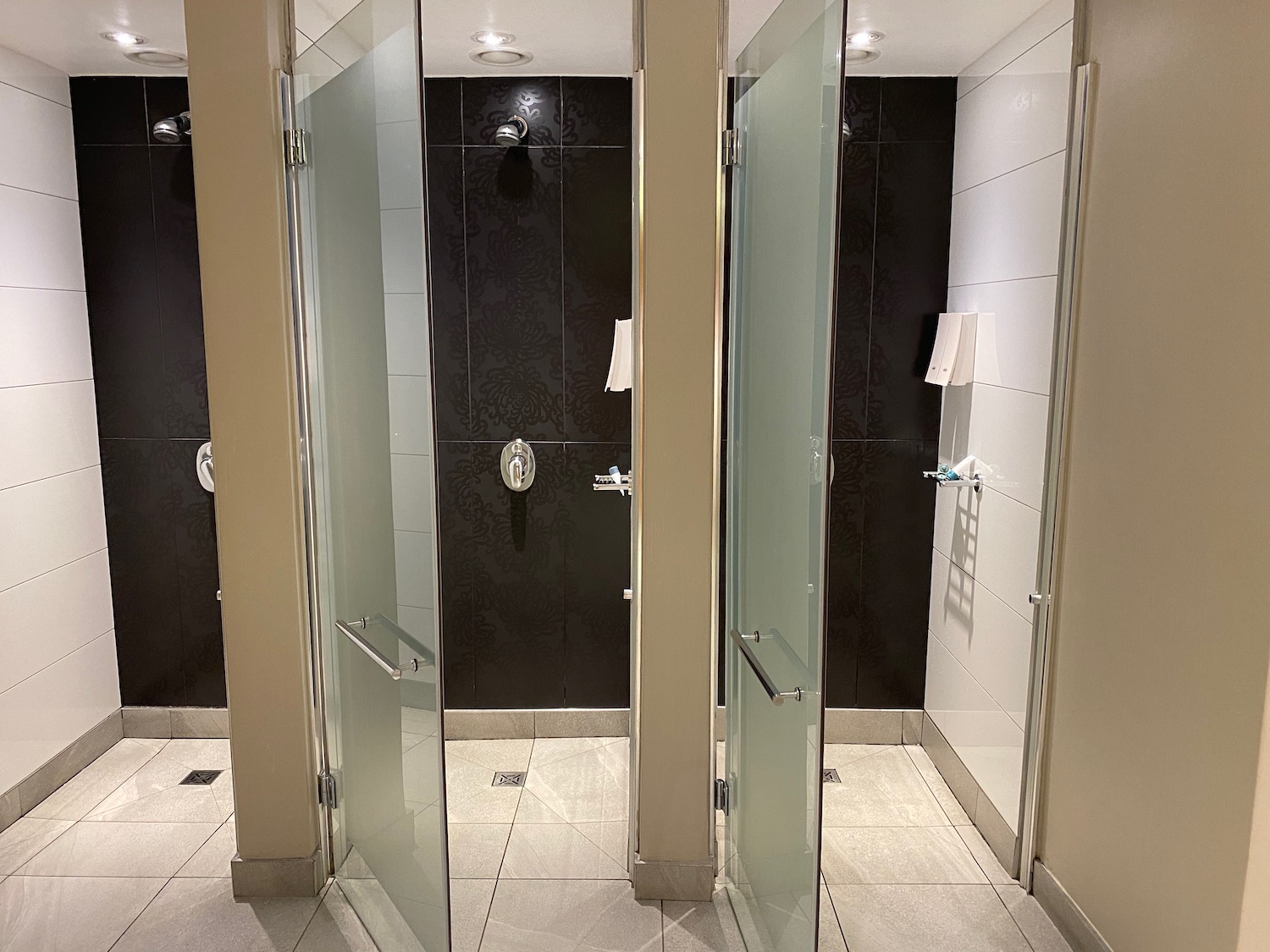 a bathroom with glass doors