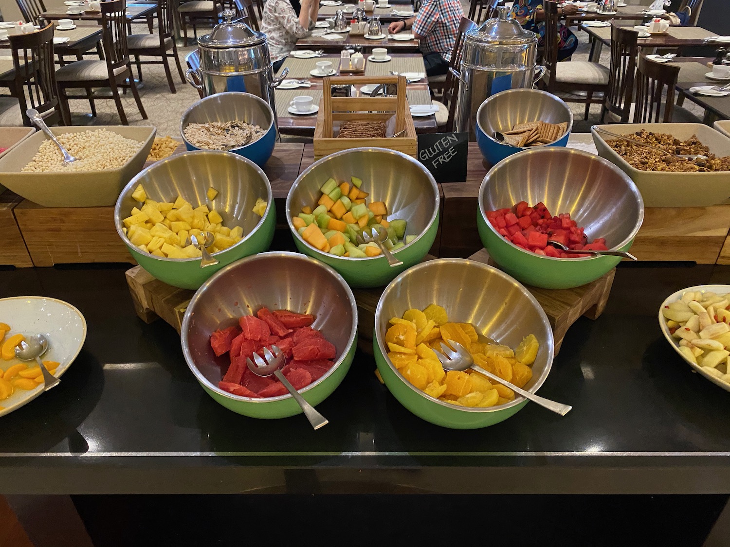 a group of bowls of fruit