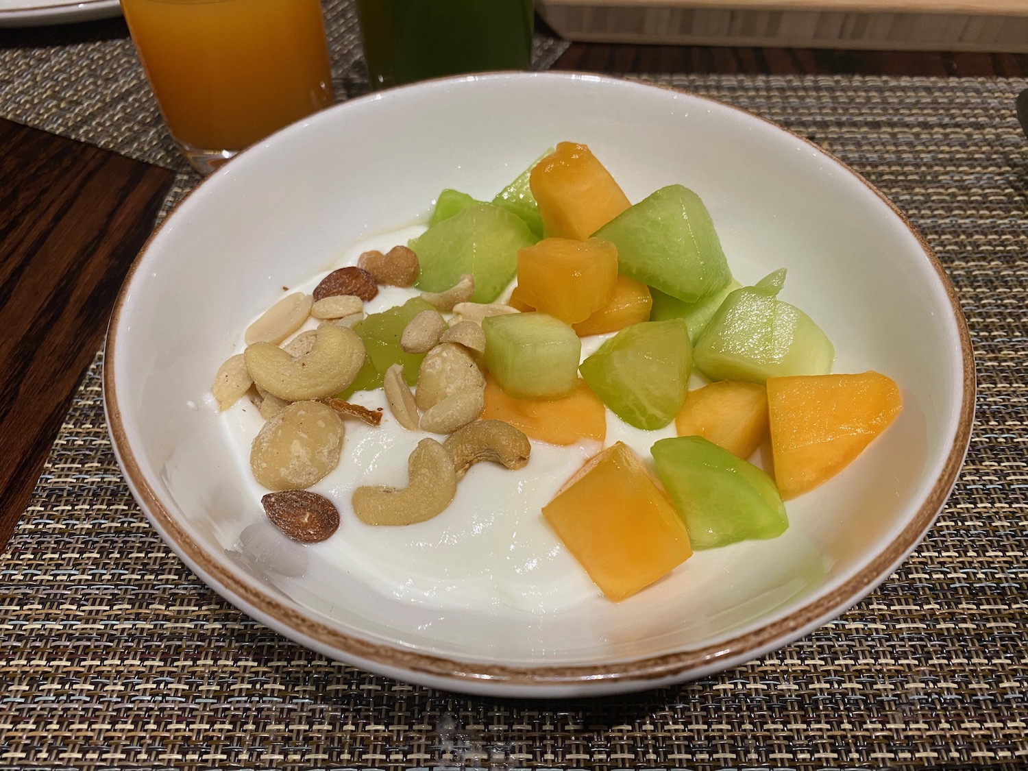 a bowl of fruit and yogurt