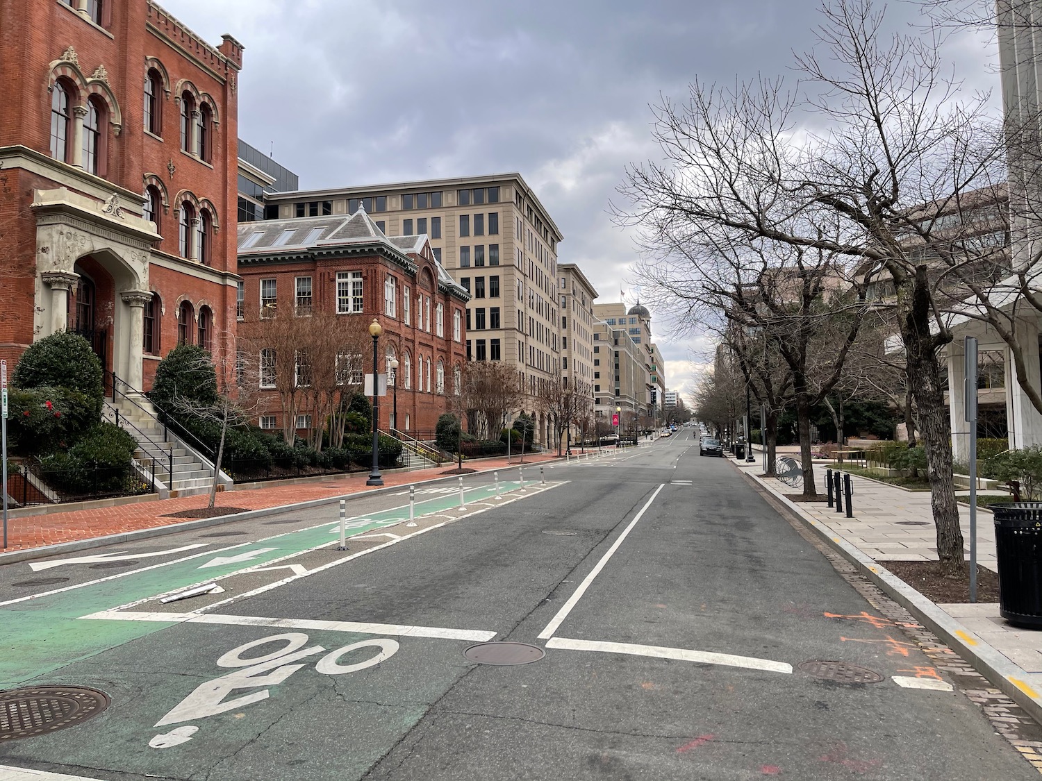 a street with buildings and trees