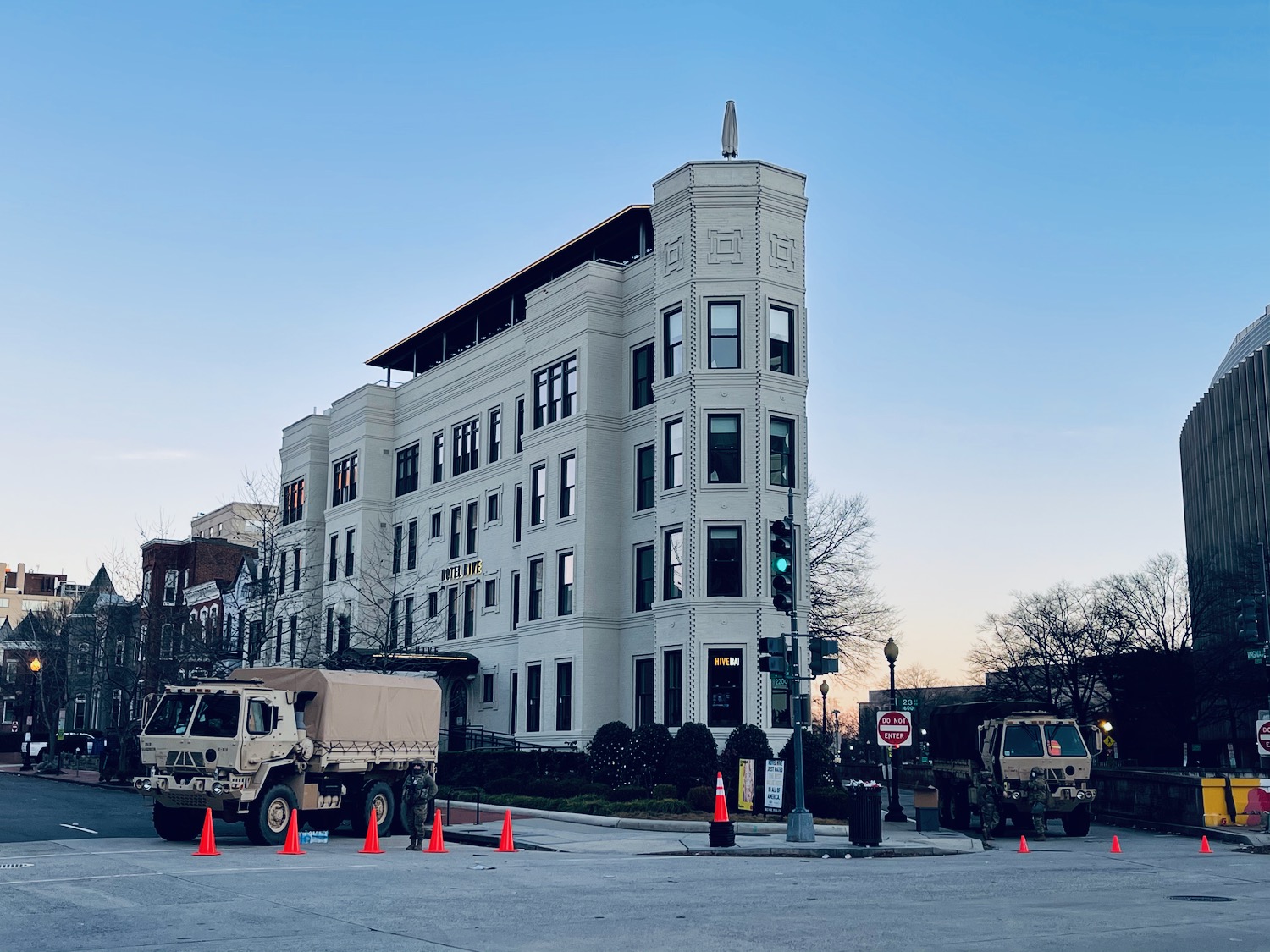 a group of trucks parked in front of a building