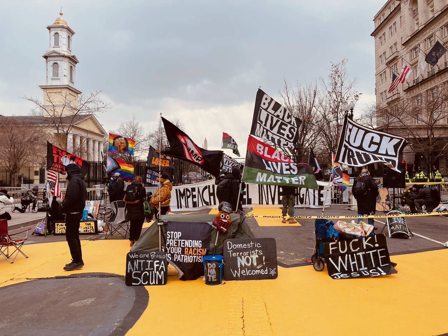 a group of people holding signs