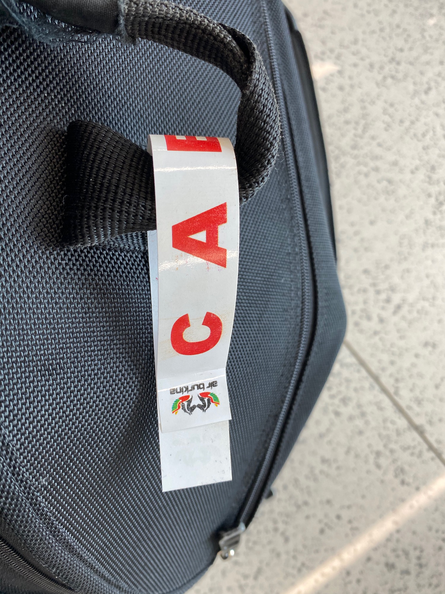 a close up of a luggage tag