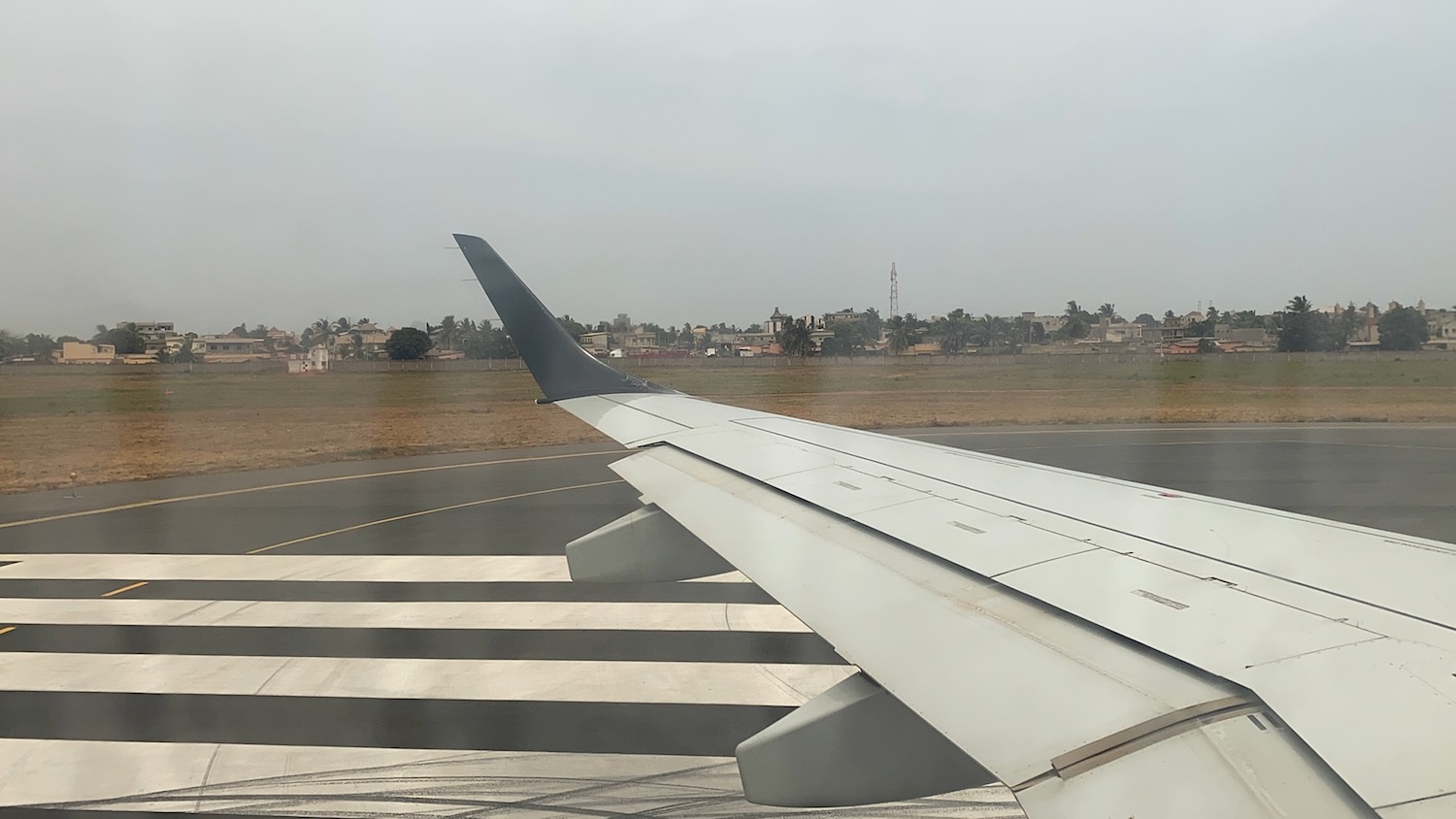 an airplane wing on a runway