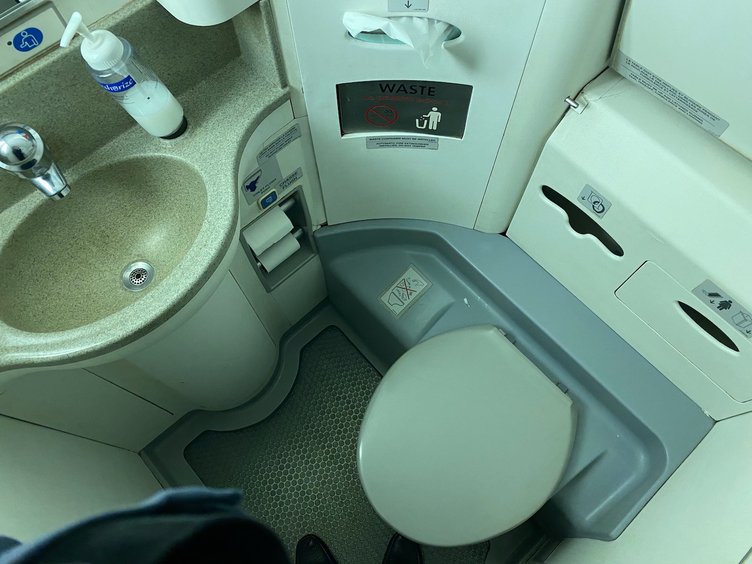 a toilet and sink in a plane