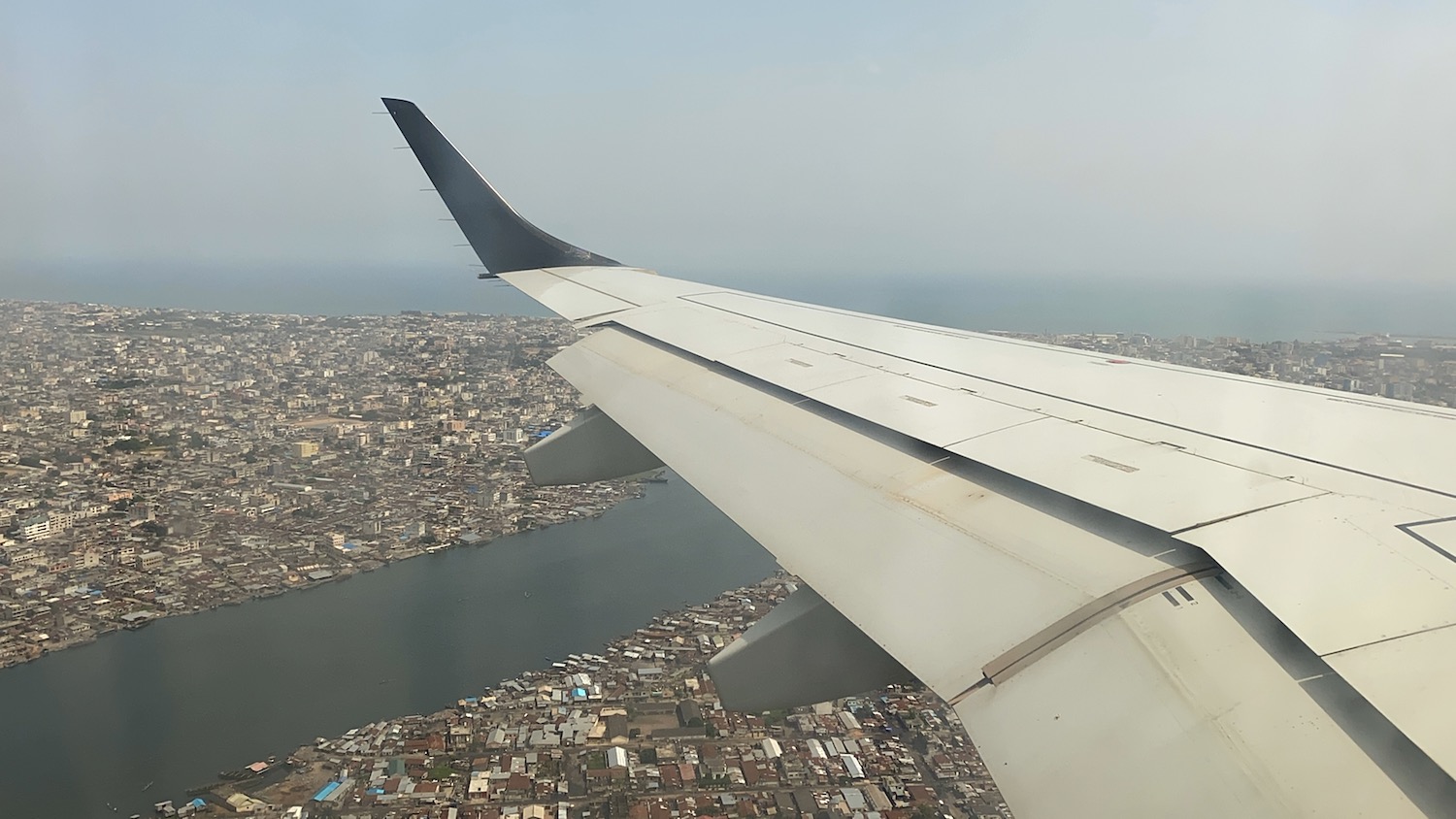 an airplane wing in the sky