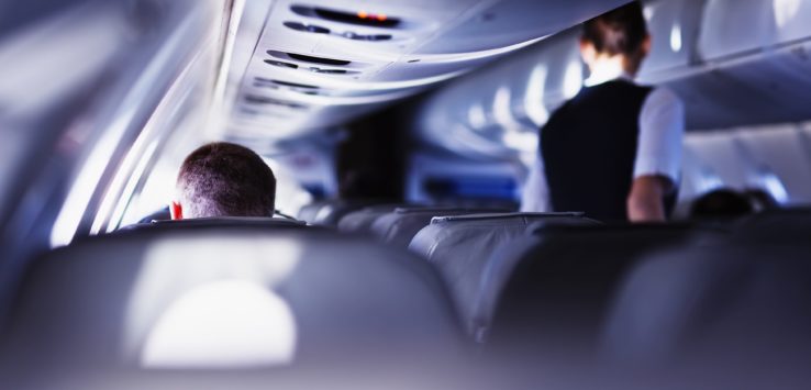 a man sitting in an airplane