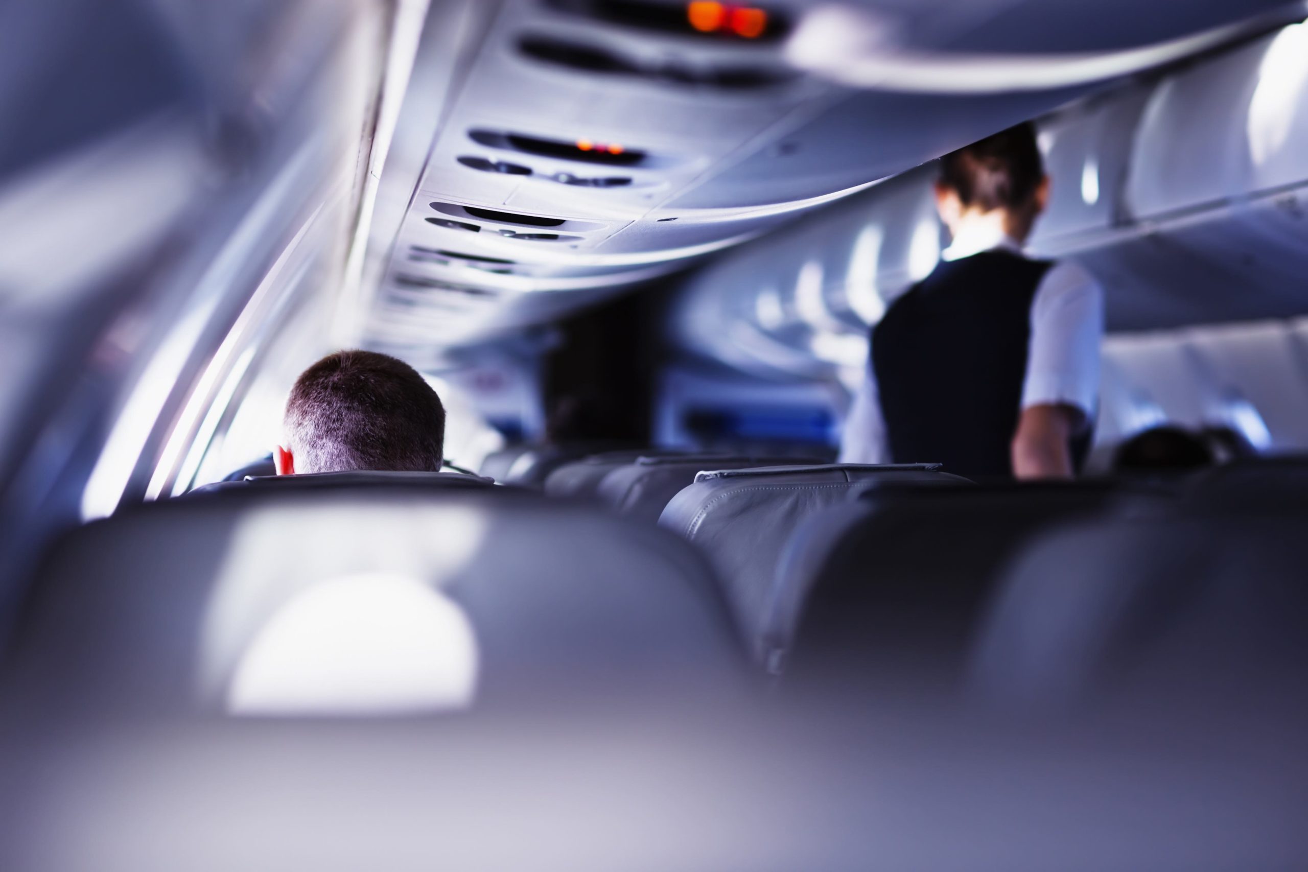 a man sitting in an airplane