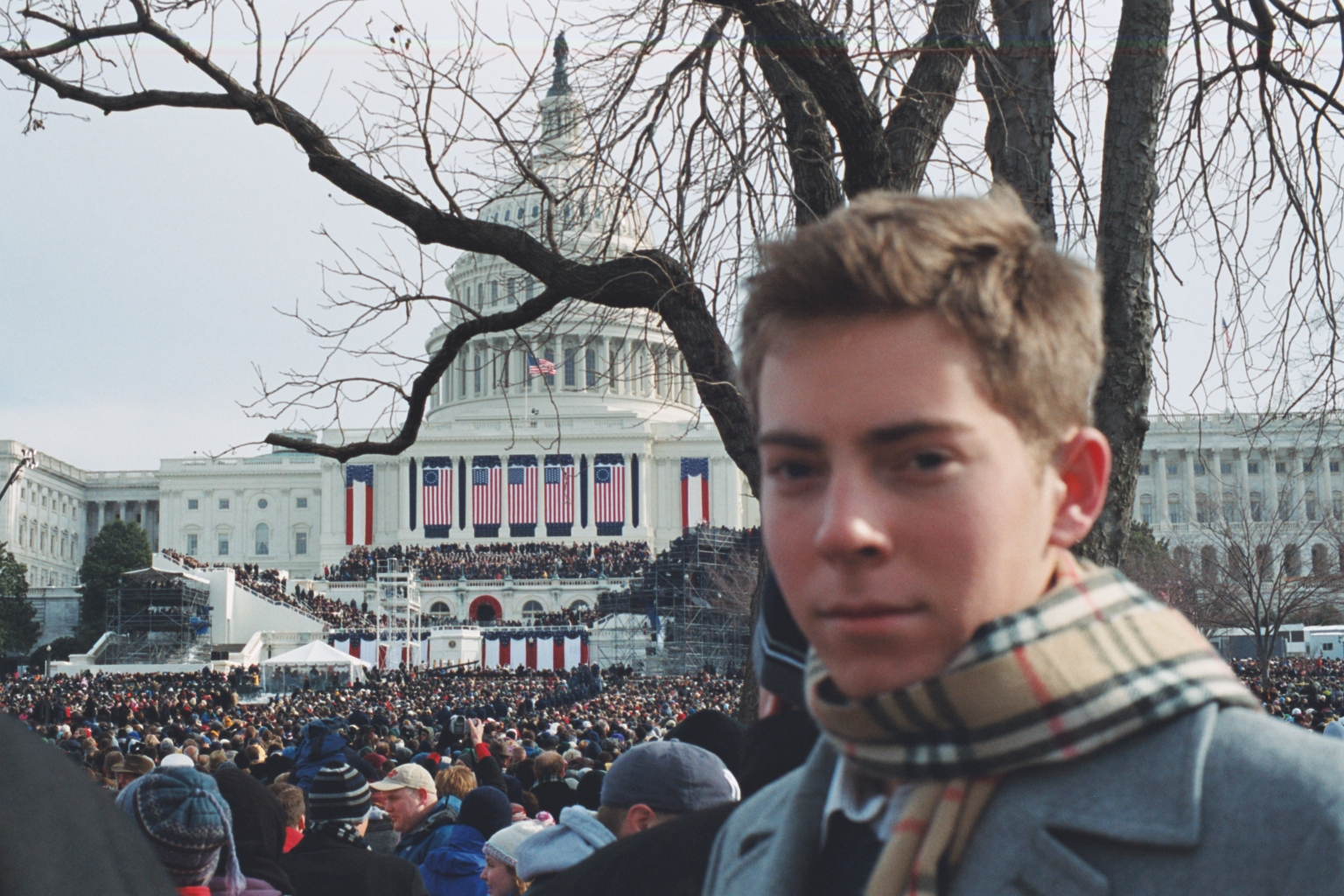 a man standing in front of a large crowd of people