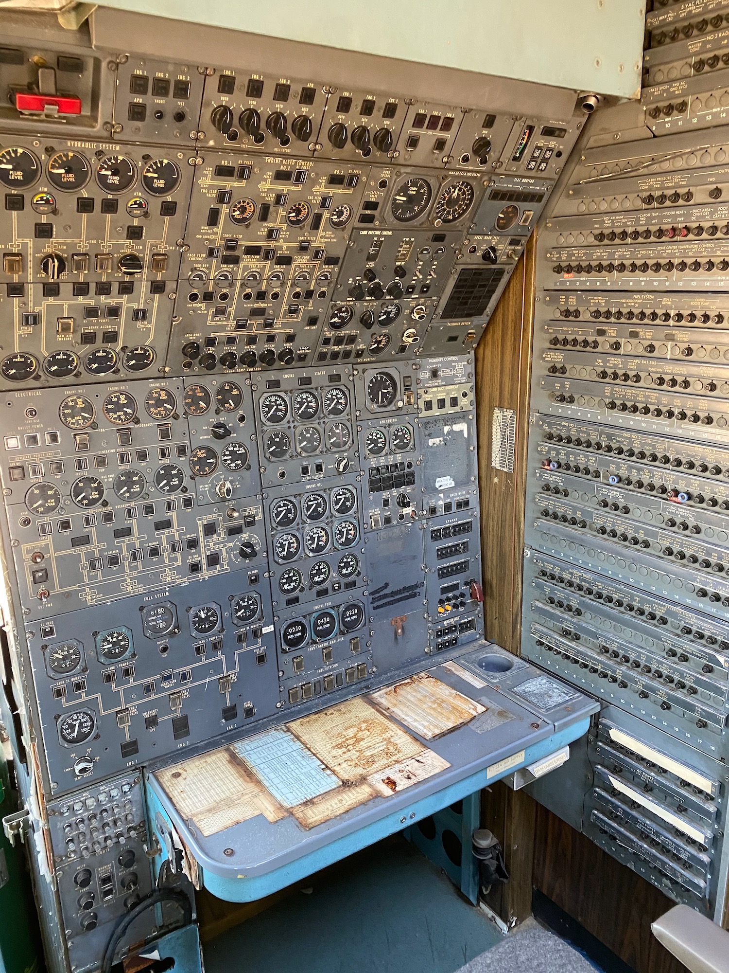 a control panel with many dials and buttons